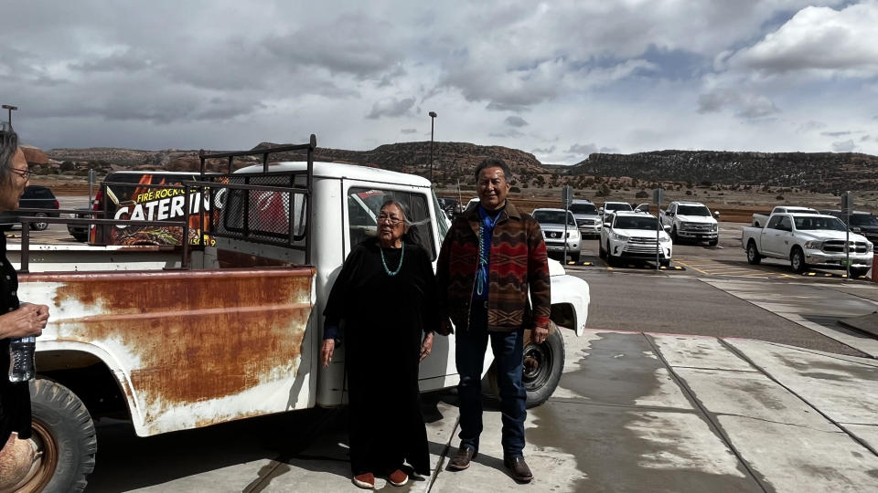 This photo provided by George Joe shows Elaine Beyal, left, Rosalind Zah and Robert Joe before a public memorial for former Navajo President Peterson Zah on Saturday, March 11, 2023, in Fort Defiance, Ariz. Peterson Zah drove the battered, white 1950s International pickup while he served as leader of the tribe, a symbol of his low-key style. (George Joe via AP)