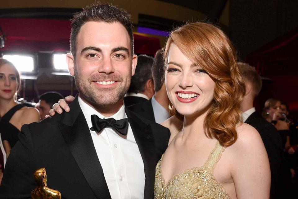 <p>Kevork Djansezian/Getty</p> Siblings Spencer Stone and Emma Stone attend the 89th Academy Awards Governors Ball in 2017.