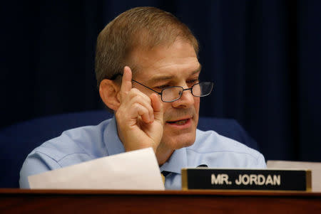 Rep. Jim Jordan (R-OH) questions FBI Deputy Assistant Director Peter Strzok as Strzok testifies before the House Committees on Judiciary and Oversight and Government Reform joint hearing on "Oversight of FBI and DOJ Actions Surrounding the 2016 Election" in the Rayburn House Office Building in Washington, U.S., July 12, 2018. REUTERS/Leah Millis