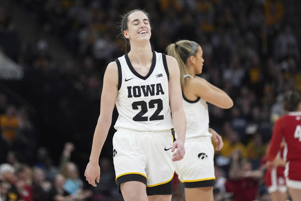 Iowa guard Caitlin Clark (22) walks down the court after missing a shot during the first half of an NCAA college basketball game against Nebraska in the final of the Big Ten women's tournament Sunday, March 10, 2024, in Minneapolis. (AP Photo/Abbie Parr)