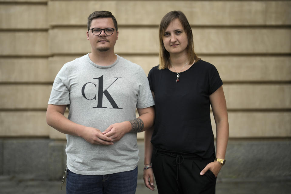 Teachers Laura Nickel, right, and Max Teske pose for a photograph after an interview with The Associated Press in Cottbus, Germany, Wednesday, July 19, 2023. Two teachers in eastern Germany tried to counter the far-right activities of students at their small town high school. Disheartened by what they say was a lack of support from fellow educators, Laura Nickel and Max Teske decided to leave Mina Witkojc School in Burg. (AP Photo/Markus Schreiber)