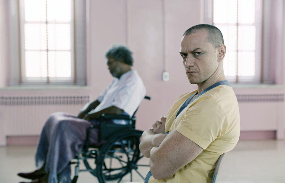 One person in a wheelchair and another man sitting in a chair with his arms folded