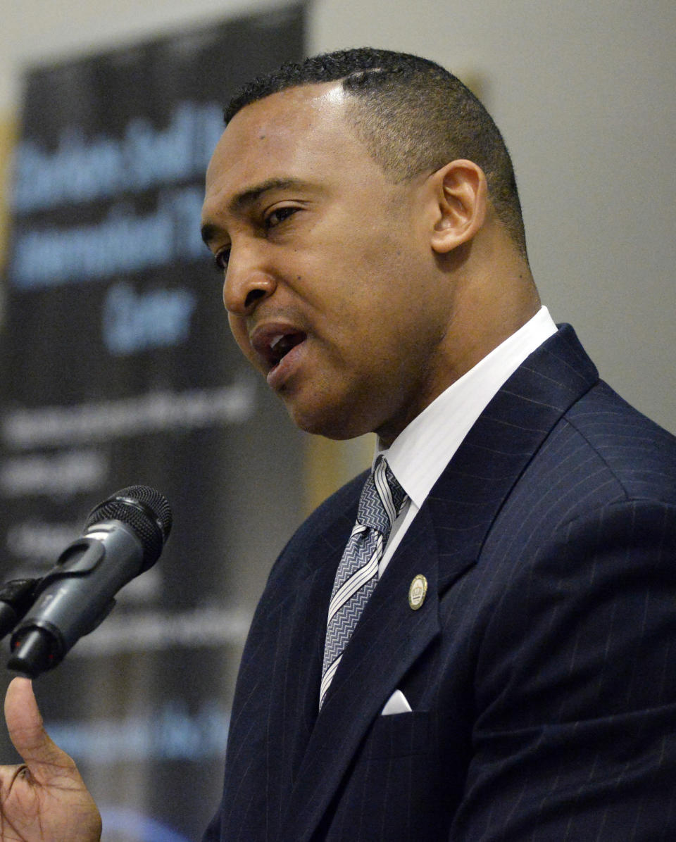 In this March 12, 2014 photo, Charlotte Mayor Patrick Cannon speaks at the Central Piedmont Community College Global Competitiveness and Transformational Thinking Summit, in Charlotte, N.C. U.S. Attorney Anne Tompkins said Wednesday, March 26, 2014, that Cannon is facing theft and bribery charges. Tompkins says Cannon solicited and accepted bribes from undercover FBI agents posing as real estate developers who wanted to do business in Charlotte. (AP Photo/The Charlotte Observer, Jeff Willhelm)