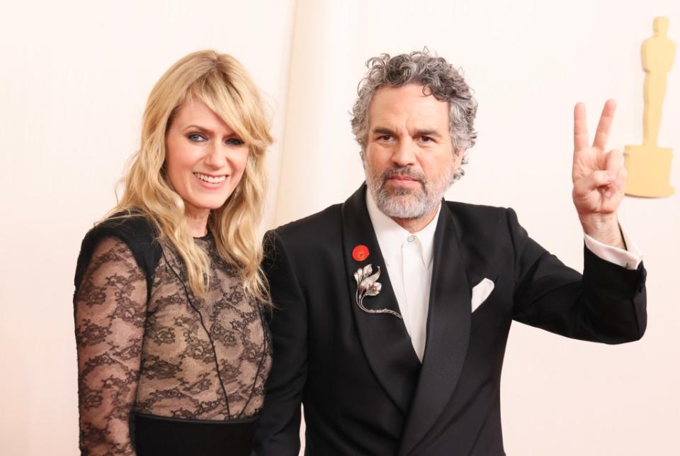 Mark Ruffalo, who was nominated for Best Supporting Actor for “Poor Things,” also wore a red pin on the Oscars red carpet — and applauded for Glazer. Getty Images