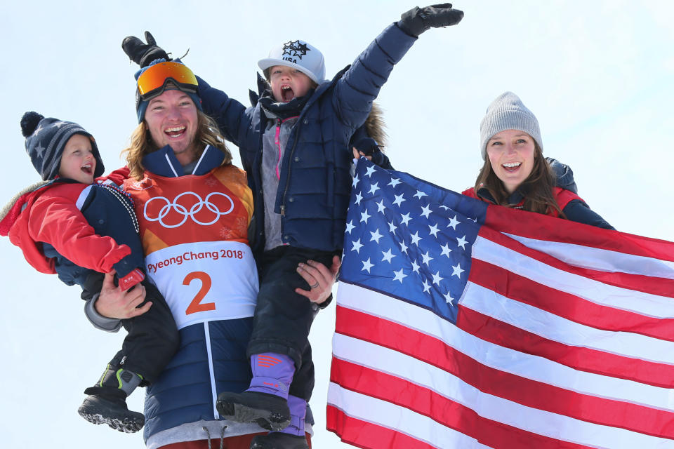 David Wise celebrates with his son Malachi, daughter Nayeli and wife Alexandra after&nbsp;taking first place during the freestyle skiing halfpipe men's finals on&nbsp;Feb. 22.