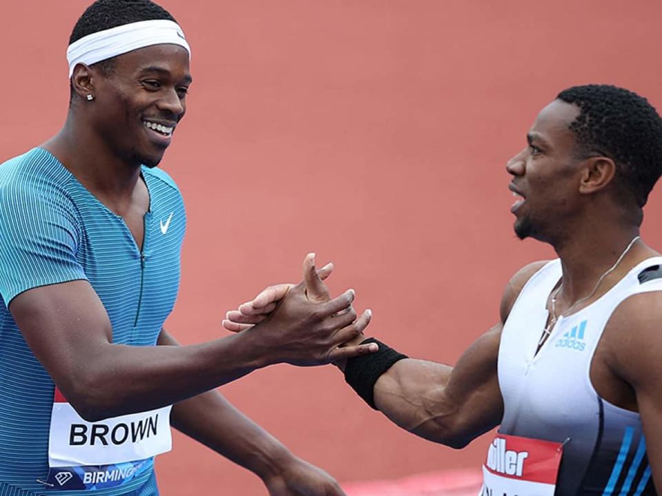 Aaron Brown was all smiles celebrating his 10.13-second victory with Jamaica's Yohan Blake at the Müller Birmingham compeition in England, the Canadian's first-ever 100-metre win on the Diamond League track and field circuit. (Action Images via Molly Darlington/Reuters - image credit)