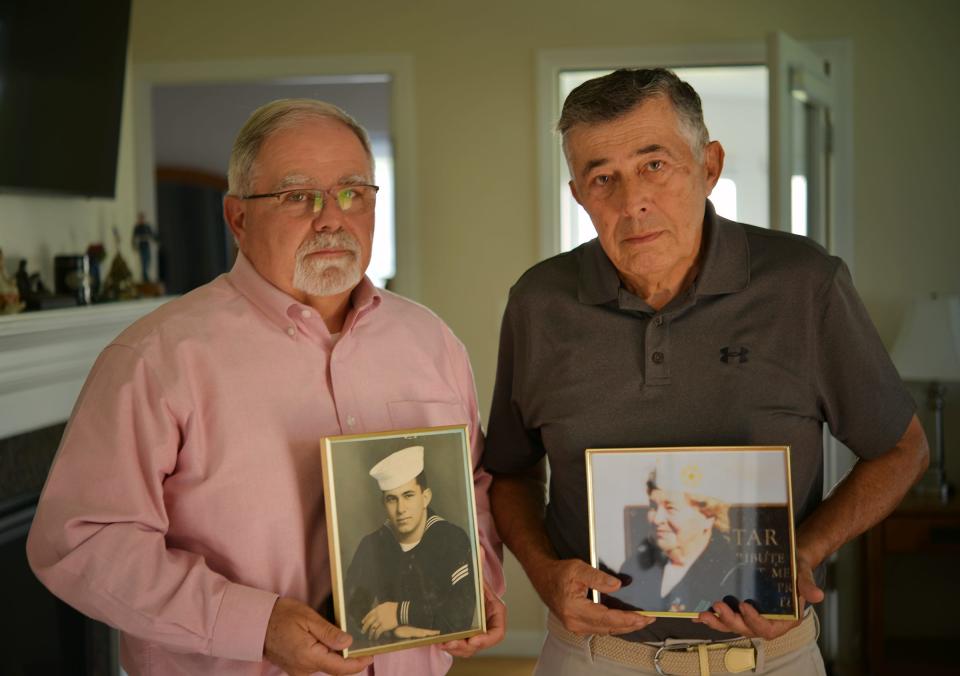 George, left, and Harry Kustigian hold photos of their brother, Michael, who was killed in Vietnam, and their Gold Star mother, Valerie Kustigian, who died May 4 at 94.