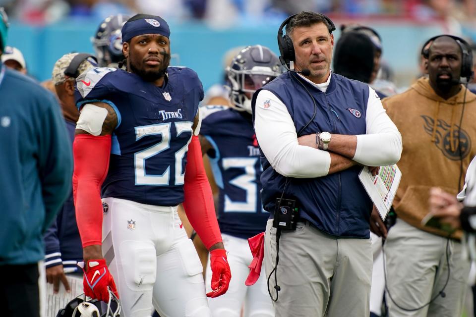 Tennessee Titans running back Derrick Henry (22) and head coach Mike Vrabel on the sideline during the second quarter against the Carolina Panthers at Nissan Stadium in Nashville, Tenn., Sunday, Nov. 26, 2023.