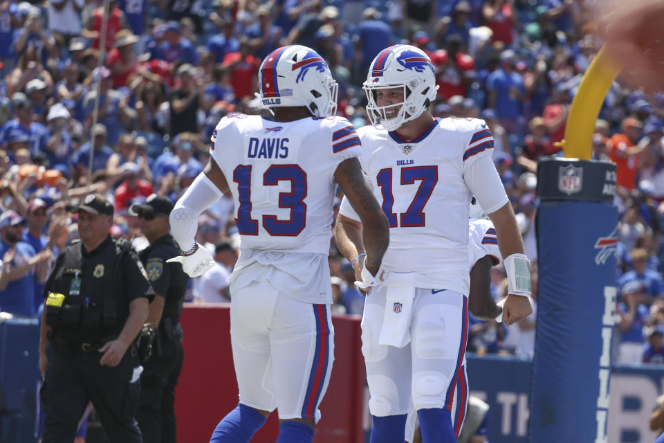 Buffalo Bills' Gabriel Davis, left, celebrates his touchdown with quarterback Josh Allen during the first half of a preseason NFL football game against the Denver Broncos, Saturday, Aug. 20, 2022, in Orchard Park, N.Y. (AP Photo/Joshua Bessex)