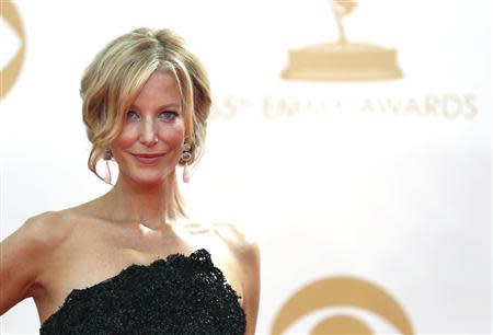 Actress Anna Gunn from AMC netwrok's series "Breaking Bad" arrives at the 65th Primetime Emmy Awards in Los Angeles September 22, 2013. REUTERS/Mario Anzuoni (UNITED STATES Tags: ENTERTAINMENT) (EMMYS-ARRIVALS)