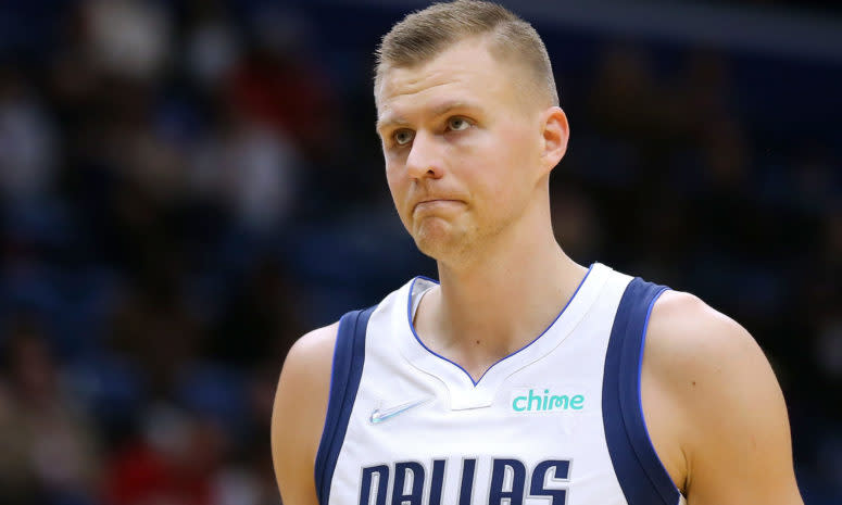 Dallas Mavericks big man Kristaps Porzingis frowning.