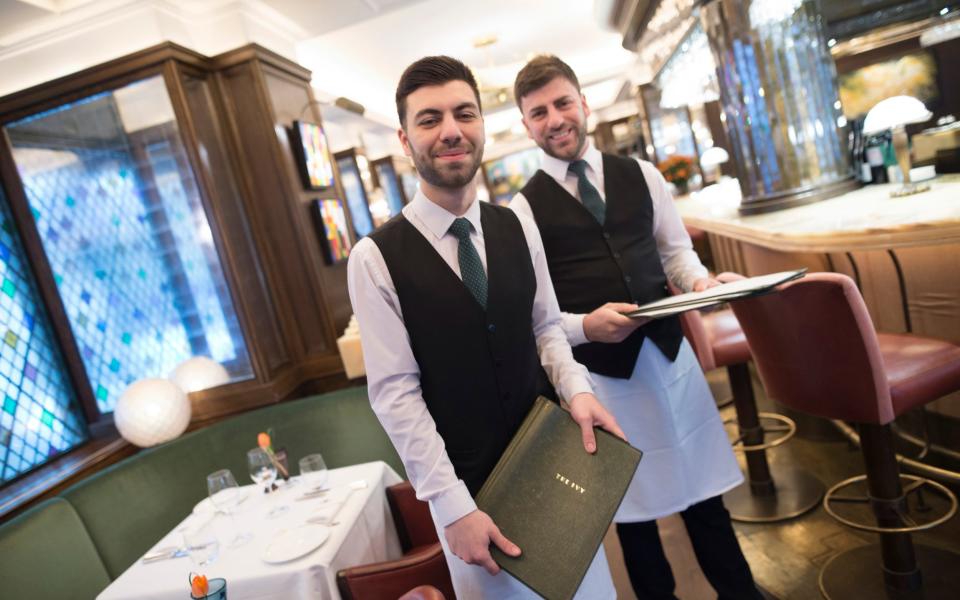 Staff at the original Ivy restaurant in Covent Garden