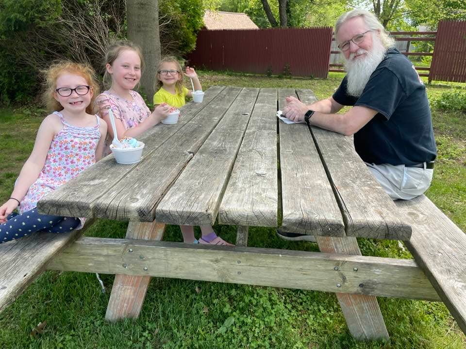 Montville resident Jim Wood (right) treated his granddaughters Mackenzie, Jadalyn and Aubrey Wood to ice cream from Millie's Ice Cream in Norwich.