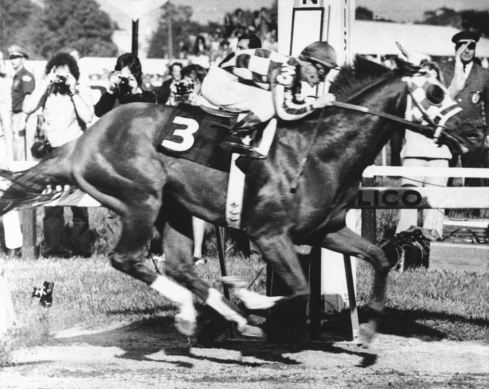 FILE - Secretariat, Ron Turcotte up, wins the 98th Preakness Stakes horse race at Pimlico Race Course in Baltimore, May 19, 1973. (AP Photo/File)