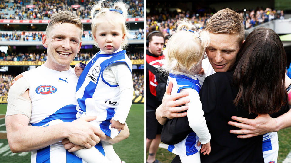 Retiring North Melbourne great Jack Ziebell celebrates with his family.