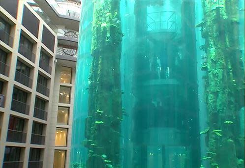 An image taken from video shot in 2003 shows people riding a two-level elevator through the middle of the Aqua-Dom aquarium, in the lobby of the DomAquarée business and leisure complex in Berlin, Germany. / Credit: Reuters