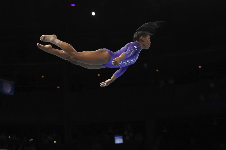 United States' Simone Biles competes on the floor during the apparatus finals at the Artistic Gymnastics World Championships in Antwerp, Belgium, Sunday, Oct. 8, 2023. (AP Photo/Geert vanden Wijngaert)