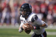 Cincinnati's Desmond Ridder (9) runs in for a touchdown during the second half of an NCAA college football game against Indiana, Saturday, Sept. 18, 2021, in Bloomington, Ind. Cincinnati won 38-24. (AP Photo/Darron Cummings)