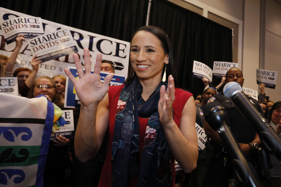 FILE - In this Tuesday, Nov. 6, 2018 file photo, Democratic house candidate Sharice Davids prepares to speak to supporters at a victory party in Olathe, Kan. Davids defeated Republican incumbent Kevin Yoder to win the Kansas' 3rd Congressional District seat. (AP Photo/Colin E. Braley)