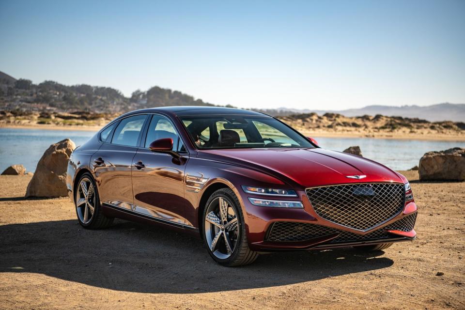 <p>With a striking exterior design and a posh cabin, the 2022 G80 legitimizes <a href="https://www.caranddriver.com/genesis" rel="nofollow noopener" target="_blank" data-ylk="slk:Genesis;elm:context_link;itc:0;sec:content-canvas" class="link ">Genesis</a> as a true luxury brand. It's also on <a href="https://www.caranddriver.com/features/a38873223/2022-editors-choice/" rel="nofollow noopener" target="_blank" data-ylk="slk:our Editors' Choice list;elm:context_link;itc:0;sec:content-canvas" class="link ">our Editors' Choice list</a>. Two turbocharged engines are offered—a 2.5-liter four-cylinder or a 3.5-liter V-6—and both deliver plentiful power and refinement. While the G80 slots in between the smaller <a href="https://www.caranddriver.com/genesis/g70" rel="nofollow noopener" target="_blank" data-ylk="slk:G70;elm:context_link;itc:0;sec:content-canvas" class="link ">G70</a> and the larger <a href="https://www.caranddriver.com/genesis/g90" rel="nofollow noopener" target="_blank" data-ylk="slk:G90;elm:context_link;itc:0;sec:content-canvas" class="link ">G90</a> in the Genesis lineup, its interior design is a cut above both of those sedans and it offers a more modern infotainment package too. The G80's fresh take on what makes a premium car premium puts it near the head of a competitive class of luxury sedans which includes established nameplates such as the <a href="https://www.caranddriver.com/audi/a6" rel="nofollow noopener" target="_blank" data-ylk="slk:Audi A6;elm:context_link;itc:0;sec:content-canvas" class="link ">Audi A6</a>, the <a href="https://www.caranddriver.com/bmw/5-series" rel="nofollow noopener" target="_blank" data-ylk="slk:BMW 5-series;elm:context_link;itc:0;sec:content-canvas" class="link ">BMW 5-series</a>, and the <a href="https://www.caranddriver.com/mercedes-benz/e-class" rel="nofollow noopener" target="_blank" data-ylk="slk:Mercedes-Benz E-class;elm:context_link;itc:0;sec:content-canvas" class="link ">Mercedes-Benz E-class</a>.<br></p><p><a class="link " href="https://www.caranddriver.com/genesis/g80" rel="nofollow noopener" target="_blank" data-ylk="slk:Review, Pricing, and Specs;elm:context_link;itc:0;sec:content-canvas">Review, Pricing, and Specs</a></p>