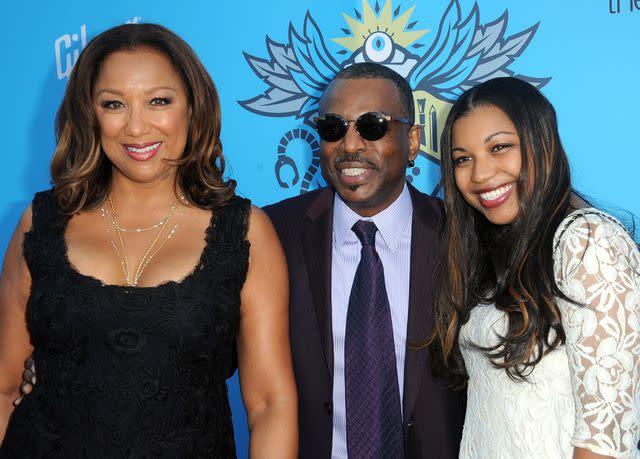 <p>Albert L. Ortega/Getty</p> LeVar Burton, his wife Stephanie Cozart Burton and their daughter Mica arrive at The Geekie Awards on Aug. 17, 2014 in Hollywood, California.