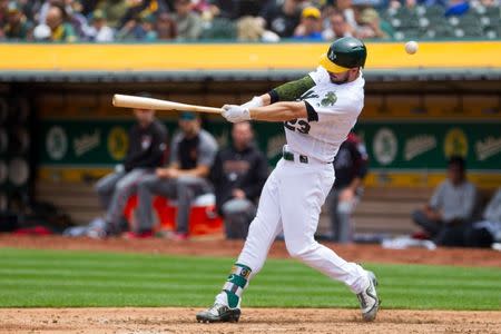 May 26, 2018; Oakland, CA, USA; Oakland Athletics left fielder Matt Joyce (23) hits a foul ball in the sixth inning at Oakland Coliseum. The Athletics won 3-0. Mandatory Credit: Andrew Villa-USA TODAY Sports