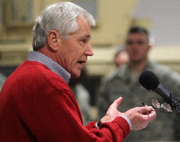 Defense Secretary Chuck Hagel speaks with airmen of the 20th Air Force 90th Missile Wing during a trip to F.E. Warren Air Force Base on Thursday, Jan. 9, 2014 in Cheyenne, Wyo. It was the first time since 1982 that a defense secretary has visited the nuclear missile base. (AP Photo/Wyoming Tribune Eagle, Blaine McCartney)