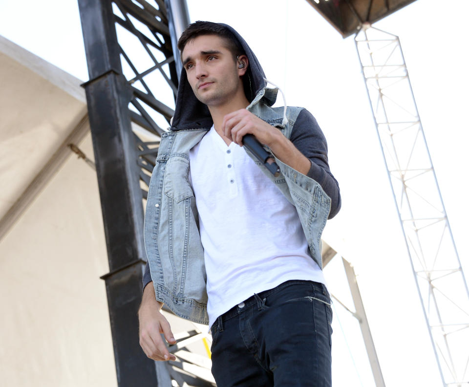 LAS VEGAS, NV - SEPTEMBER 21:  Tom Parker of The Wanted performs onstage during the iHeartRadio Music Festival Village on September 21, 2013 in Las Vegas, Nevada.  (Photo by Jason Kempin/Getty Images for Clear Channel)