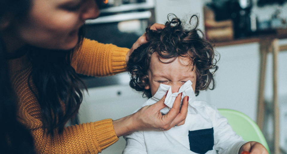 The kids are sick again — and working moms are not OK. (Photo: Getty)