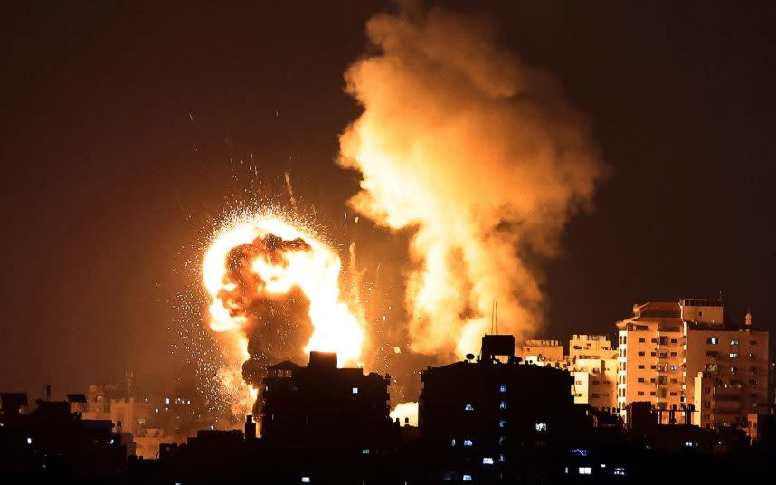 Israeli air strikes land on Gaza City after rockets were fired from the Palestinian territory   - MAHMUD HAMS /AFP