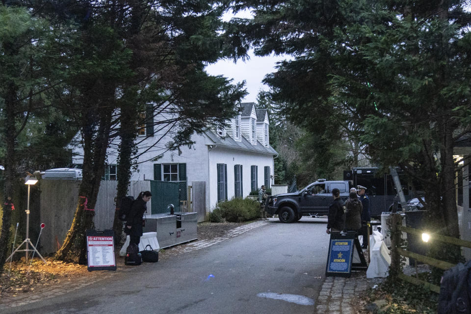 FILE - The access road to President Joe Biden's home in Wilmington, Del., is seen from the media van on Jan. 13, 2023. The Justice Department has searched Biden’s home in Delaware and located six documents containing classified markings and also took possession of some of his notes, the president’s lawyer said Saturday, Jan. 21. (AP Photo/Carolyn Kaster, File)