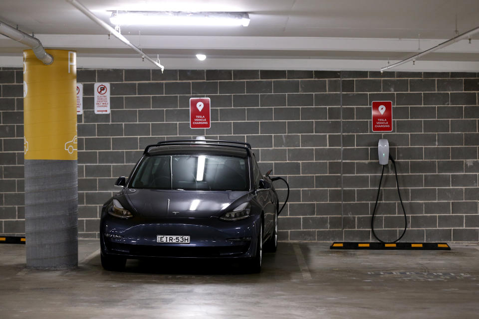  A Tesla Model Y charges at an EV charging station in Lane Cove Sydney, Australia. 