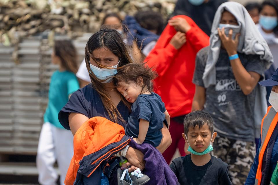 Guatemalan migrants who were deported from the U.S. deplane at La Aurora International Airport in Guatemala City on Thursday.