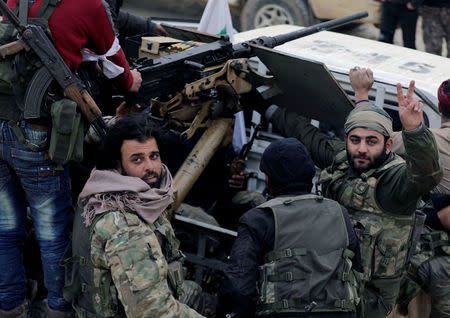 Turkish-backed Free Syrian Army fighters are seen near Mount Barsaya, northeast of Afrin, Syria January 22, 2018. REUTERS/Khalil Ashawi