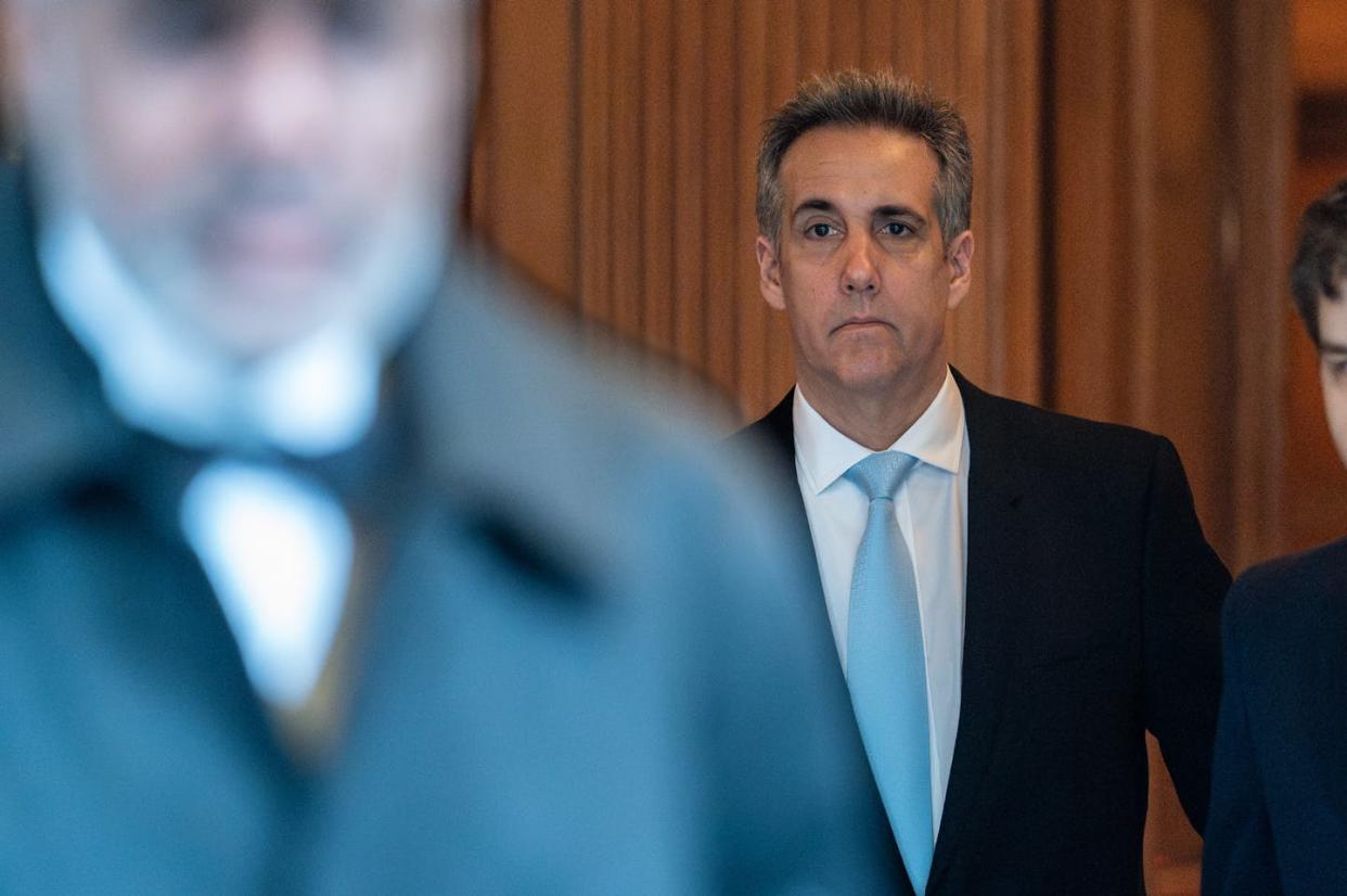 Michael Cohen leaves his home to attend his second day of testimony at Manhattan Criminal Court on May 14, 2024, in New York City. <a href="https://www.gettyimages.com/detail/news-photo/former-donald-trump-attorney-michael-cohen-departs-from-his-news-photo/2152348667?searchscope=image%2Cfilm&adppopup=true" rel="nofollow noopener" target="_blank" data-ylk="slk:David Dee Delgado/Getty Images;elm:context_link;itc:0;sec:content-canvas" class="link ">David Dee Delgado/Getty Images</a>