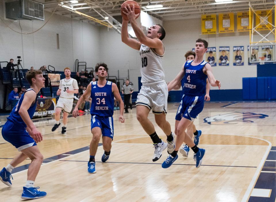 Evansville Day School’s Tyler Myers (10) goes up for a basket as the Eagles play the South Spencer Rebels in Evansville, Ind., Tuesday evening, Jan. 11, 2022. 