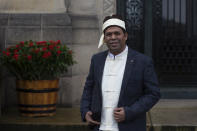 Tun Khin, President of the Burmese Rohingya Organisation UK, leaves the International Court in The Hague, Netherlands, Thursday, Jan. 23, 2020, after the court ordered Myanmar take all measures in its power to prevent genocide against the Rohingya. The United Nations' top cour issued a decision on a request by Gambia. (AP Photo/Peter Dejong)