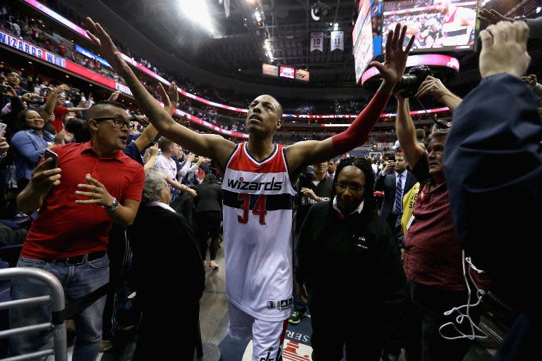 Paul Pierce of the Washington Wizards celebrates their 106-99 win over the Toronto Raptors during Game Three of the Eastern Conference Quarterfinals of the NBA playoffs at Verizon Center on April 24, 2015 in Washington, DC