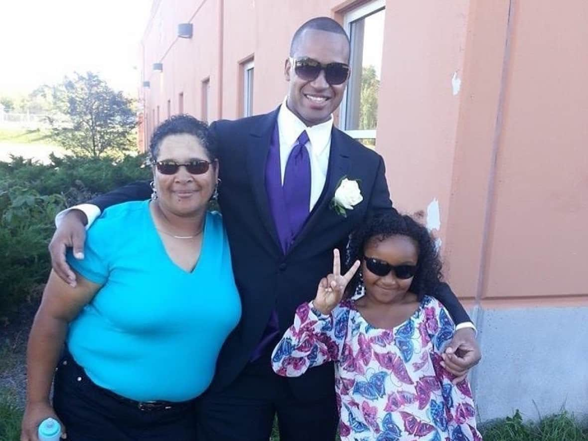 Lionel Desmond, shown here in this family photo, with his mother, Brenda, left, and daughter, Aaliyah, right. The role that race and racism played in their deaths was explored at a fatality inquiry Monday. (Submitted by Cassandra Desmond - image credit)