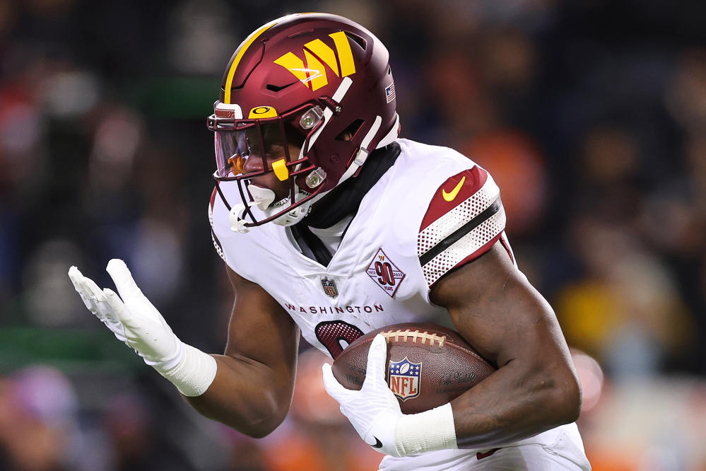 Washington Commanders running back Brian Robinson Jr. dives for a six  News Photo - Getty Images