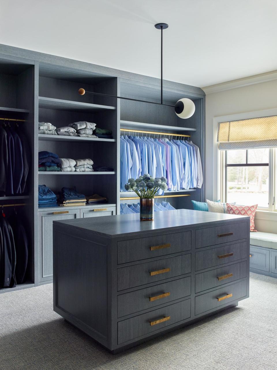 Dark blue closet with island