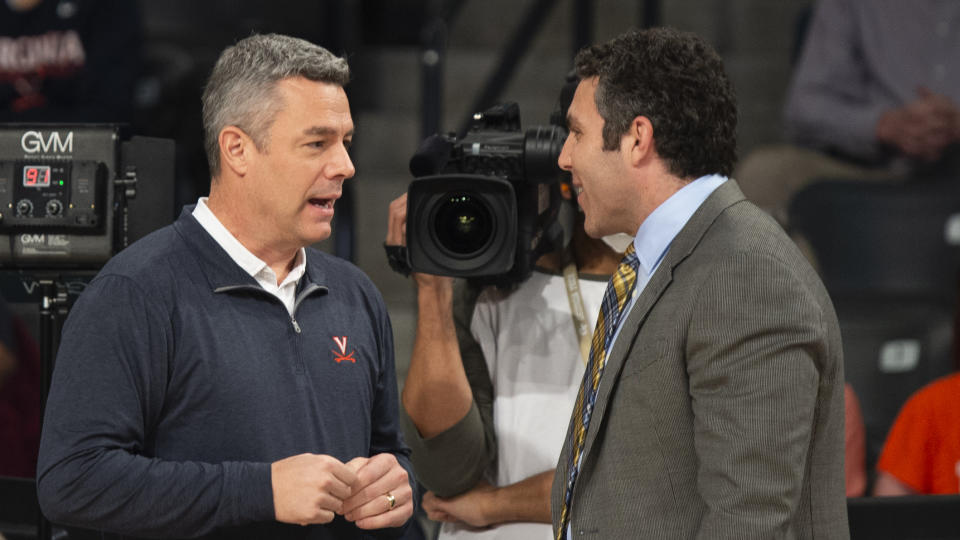 Virginia head coach Tony Bennett, left, speaks with Georgia Tech head coach Josh Pastner before an NCAA college basketball game, Friday, Dec. 30, 2022, in Atlanta. (AP Photo/Hakim Wright Sr.)