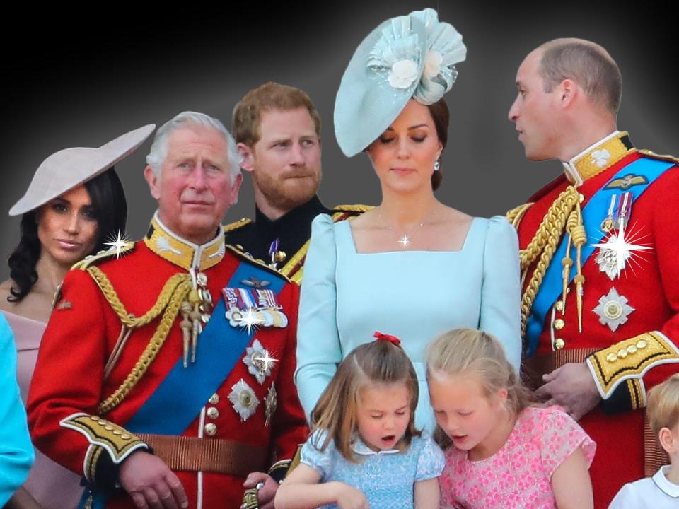 The British royal family stands on the balcony of Buckingham Palace.