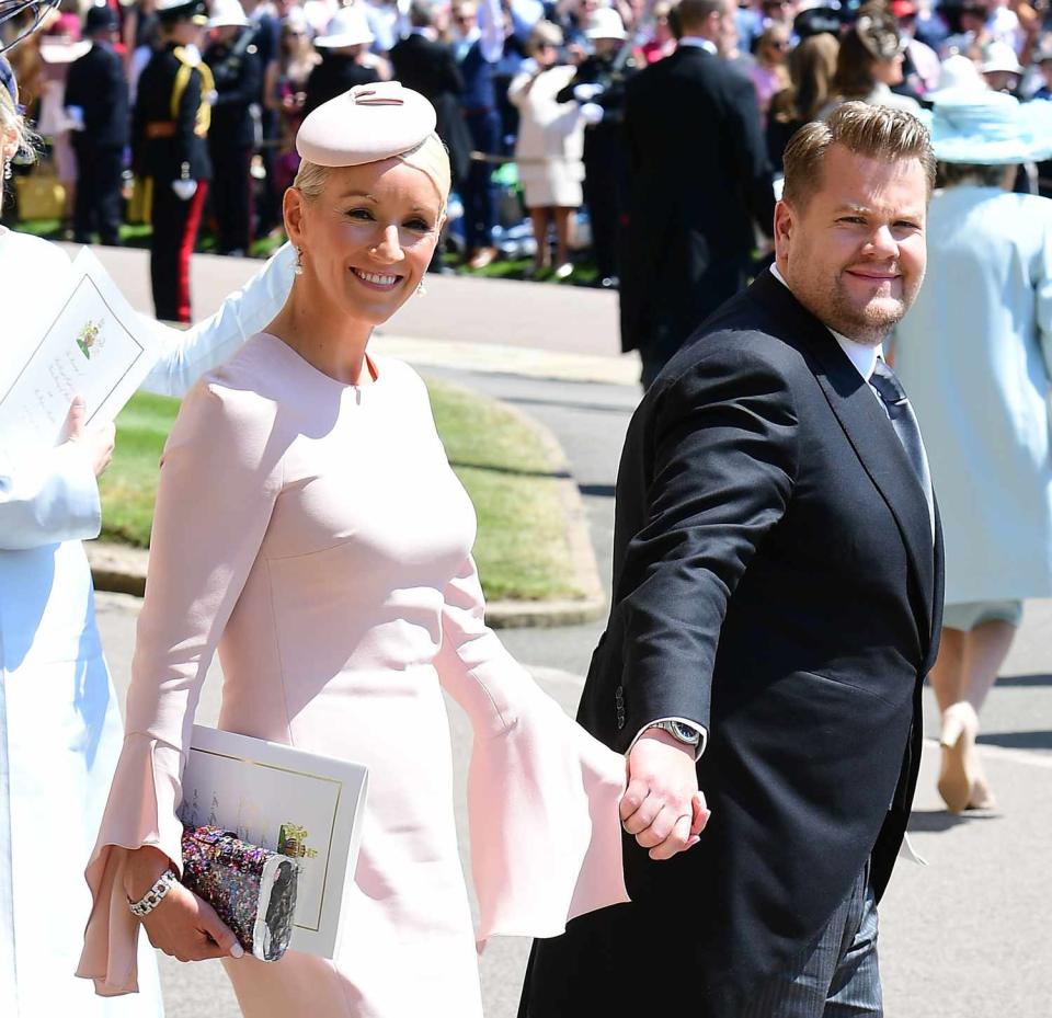 James Corden and J2ulia Carey leave St George's Chapel at Windsor Castle after the wedding of Meghan Markle and Prince Harry on May 19, 2018 in Windsor, England