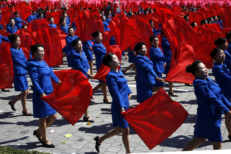 Performers take part in a parade for the 70th anniversary of North Korea's founding day in Pyongyang, North Korea, Sunday, Sept. 9, 2018. North Korea staged a major military parade, huge rallies and will revive its iconic mass games on Sunday to mark its 70th anniversary as a nation. (AP Photo/Ng Han Guan)