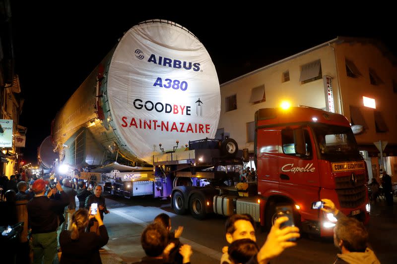 A fuselage section of the last Airbus A380 airplane passes through Levignac
