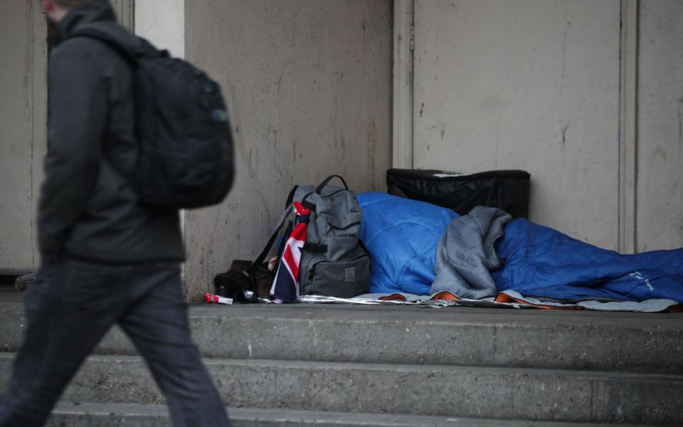 Homeless person sleeping - Yui Mok/PA