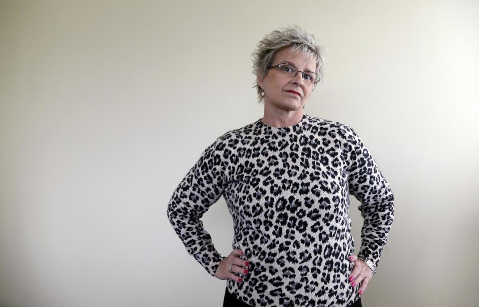 Cecilia Sivertson stands in her office in Lynnwood, Wash., in this photo made Thursday, Nov. 14, 2013 Sivertson worked for eight years as a paralegal in the prosecutor’s office for Washington’s most populous county. She helped make sure people paid child support and tracked down deadbeat dads. It was a rewarding, stressful and sometimes depressing job. After her husband died in a car accident in 2001, she decided she needed a more upbeat line of work and joined a labeling business. 55-years-old, she has epilepsy and arthritis in her hands. About two years ago, she says, she noticed improvement in both when she started using marijuana. Last spring, she began making products infused with cannabis oil under her “Nana’s Secret” line. Her specialty is pot-infused soda _ with the soda concentrate produced by a client of the labeling business. The Alabama native says she’s applying to become a licensed marijuana processor so her sodas and other items can be sold in retail pot stores. (AP Photo/Elaine Thompson)