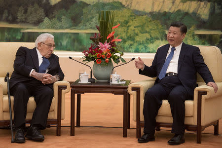 Former U.S. Secretary of State Henry Kissinger (L) meets China's President Xi Jinping at the Great Hall of the People in Beijing, China December 2, 2016. REUTERS/Nicolas Asouri/Pool