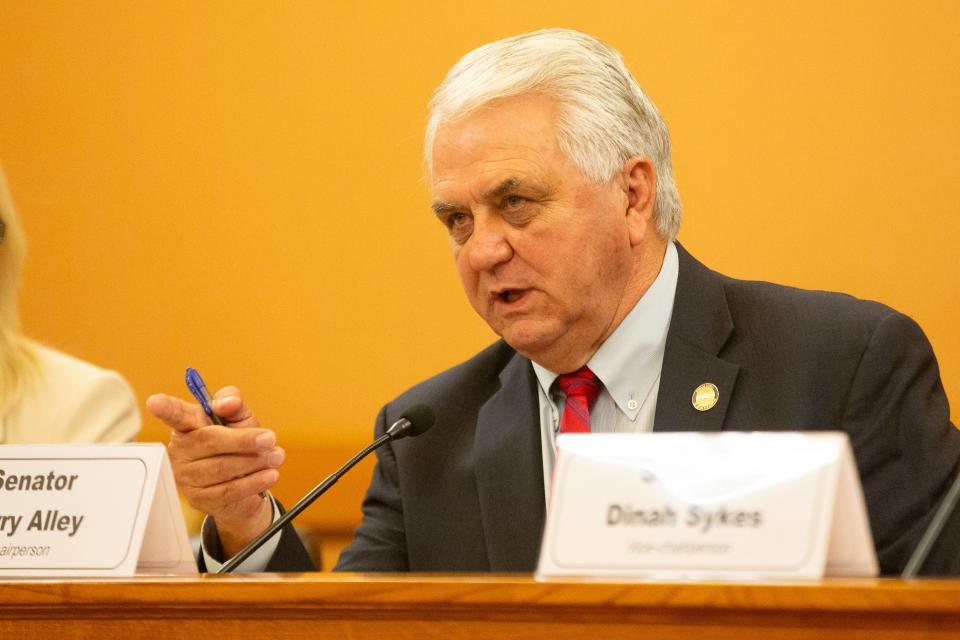 Sen. Larry Alley, R-Winfield and chair of the Senate Confirmation Oversight Committee, questions Annie Kuether during the confirmation hearing for her appointment to the Kansas Corporation Commission on Wednesday at the Statehouse.